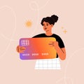 Young woman holds a big credit card. Personal finance concept. Online banking, digital money, cashless payment Royalty Free Stock Photo